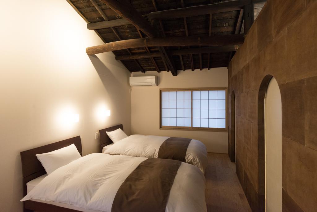 Вілла Kakishibu An Machiya House Кіото Номер фото
